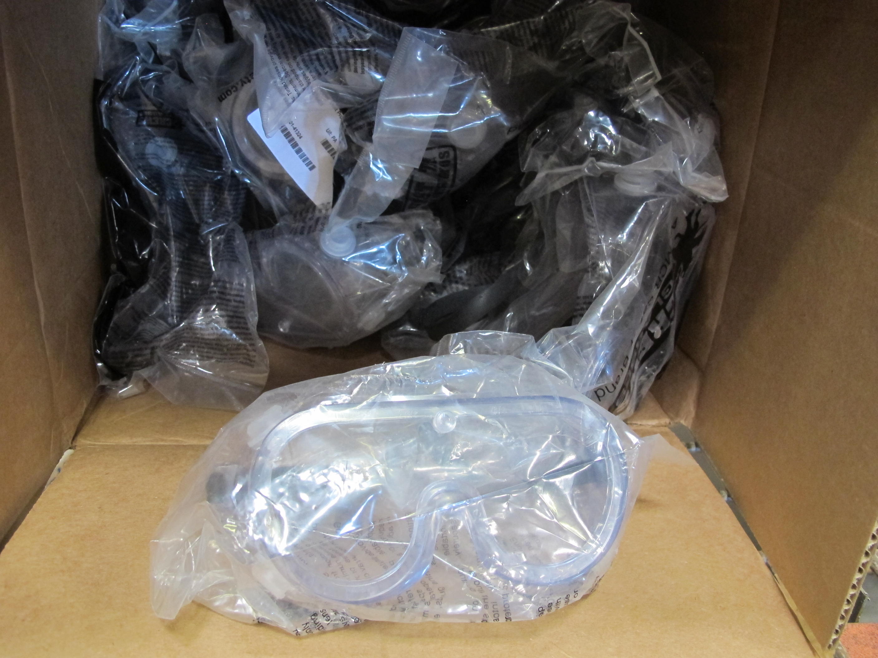 LOT TO INCLUDE: (2) FIXTURES, LIGHTING TYPE, 120 VOLT, HIGH PRESSURE SODIUM LAMP, 150 WATT. PENDANT MOUNTED, PRISMATIC GLASS REFRACTOR, SYMMETRICAL INTEGRAL BALLASTS, WITH LAMP, (20+) GOGGLES, DUST PROTECTION & CHEMICAL SPLASH KIND, CLEAR LENS, (14 BOXES) GLOVES, EXTRA LARGE SIZE, SURGEONS, INCINERABLE KIND, LATEX (7 MIL) MATERIAL, OFF-WHITE COLOR. AMBIDEXTROUS, 10" LENGTH, ROLLED CUFF, ETC.. LOADING & HANDLING FEE $15-4178